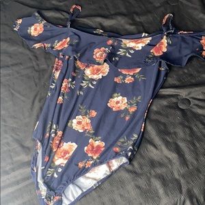 A flower body suit